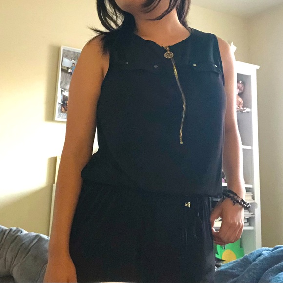 Black romper with gold detailing on the zipper and strings - Picture 1 of 3